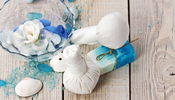 Kräuterstempelmassage